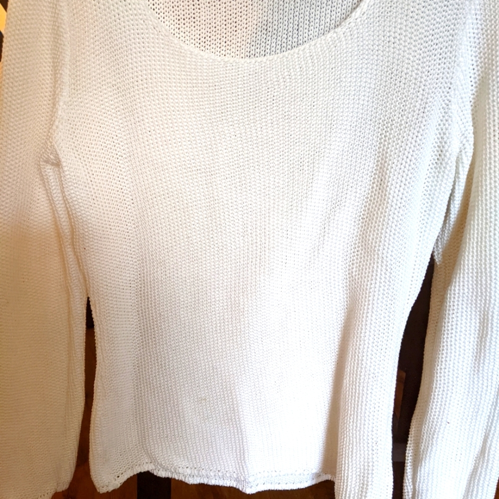 White long sleeve knit shirt.